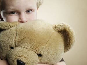 Small child with teddy bear