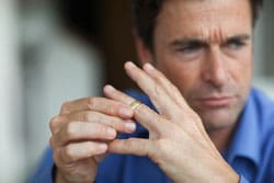 Man toying with wedding ring